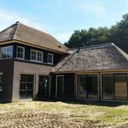 Vrijstaande woning met rieten kap Overasselt 